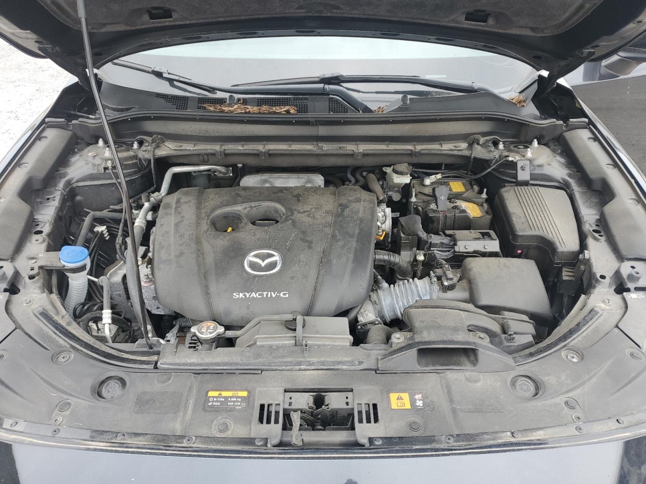 2021 Mazda Cx-5 Touring VIN: JM3KFBCMXM0390619 Lot: 80279575