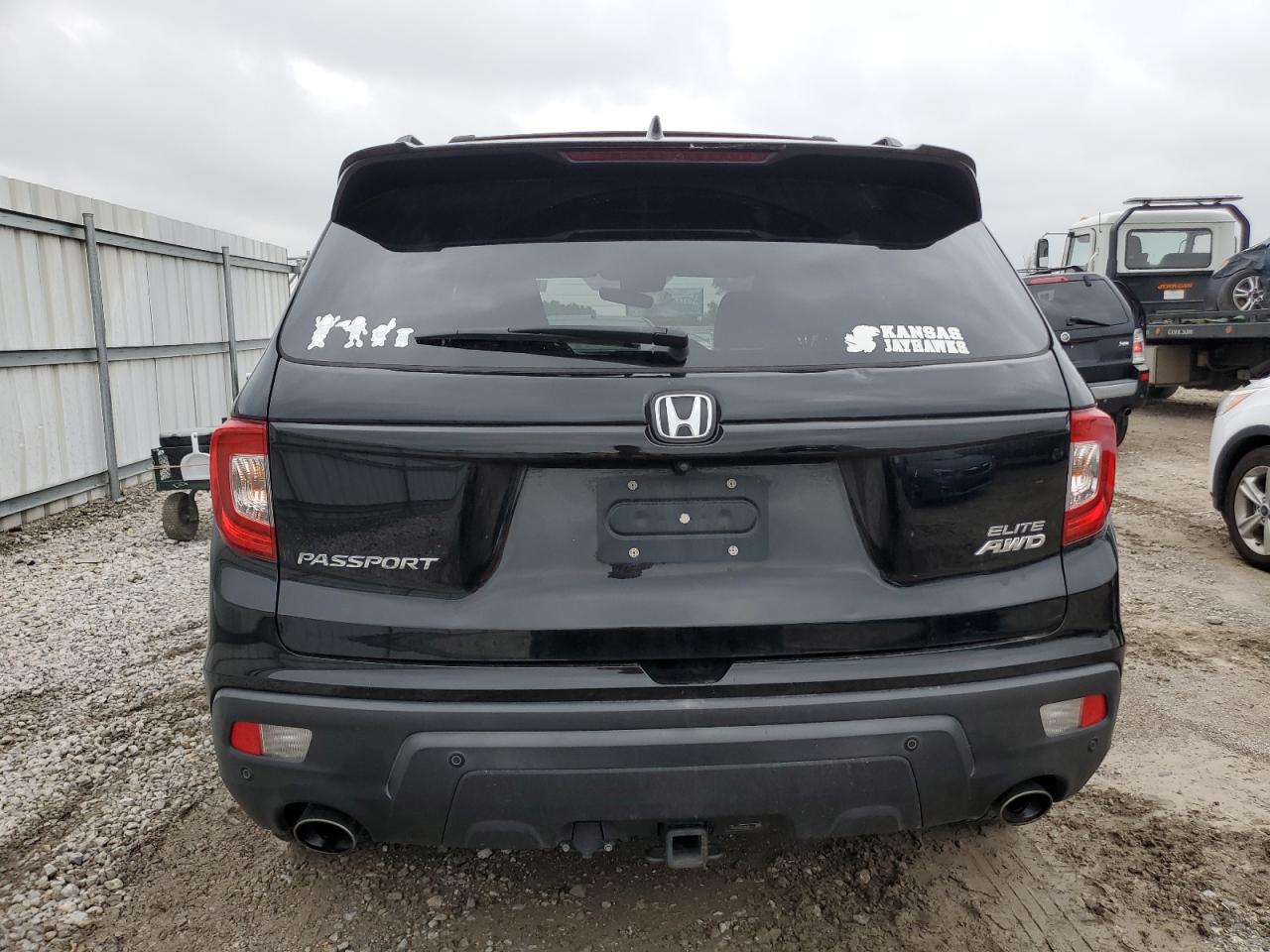 2019 Honda Passport Elite VIN: 5FNYF8H01KB012957 Lot: 82051255