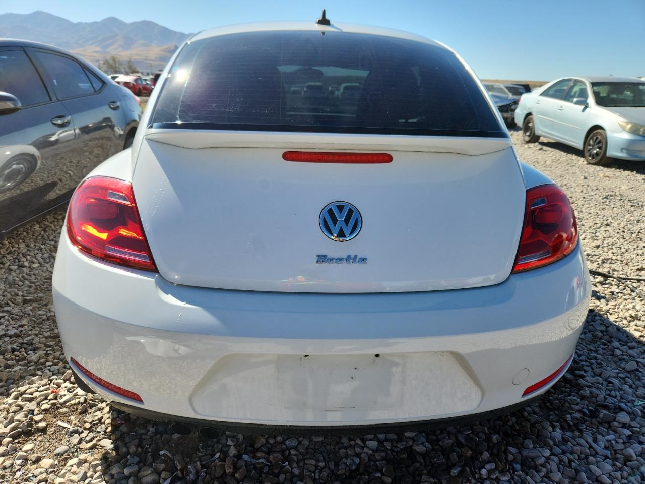 2015 Volkswagen Beetle 1.8T VIN: 3VWF17AT4FM600970 Lot: 82159445