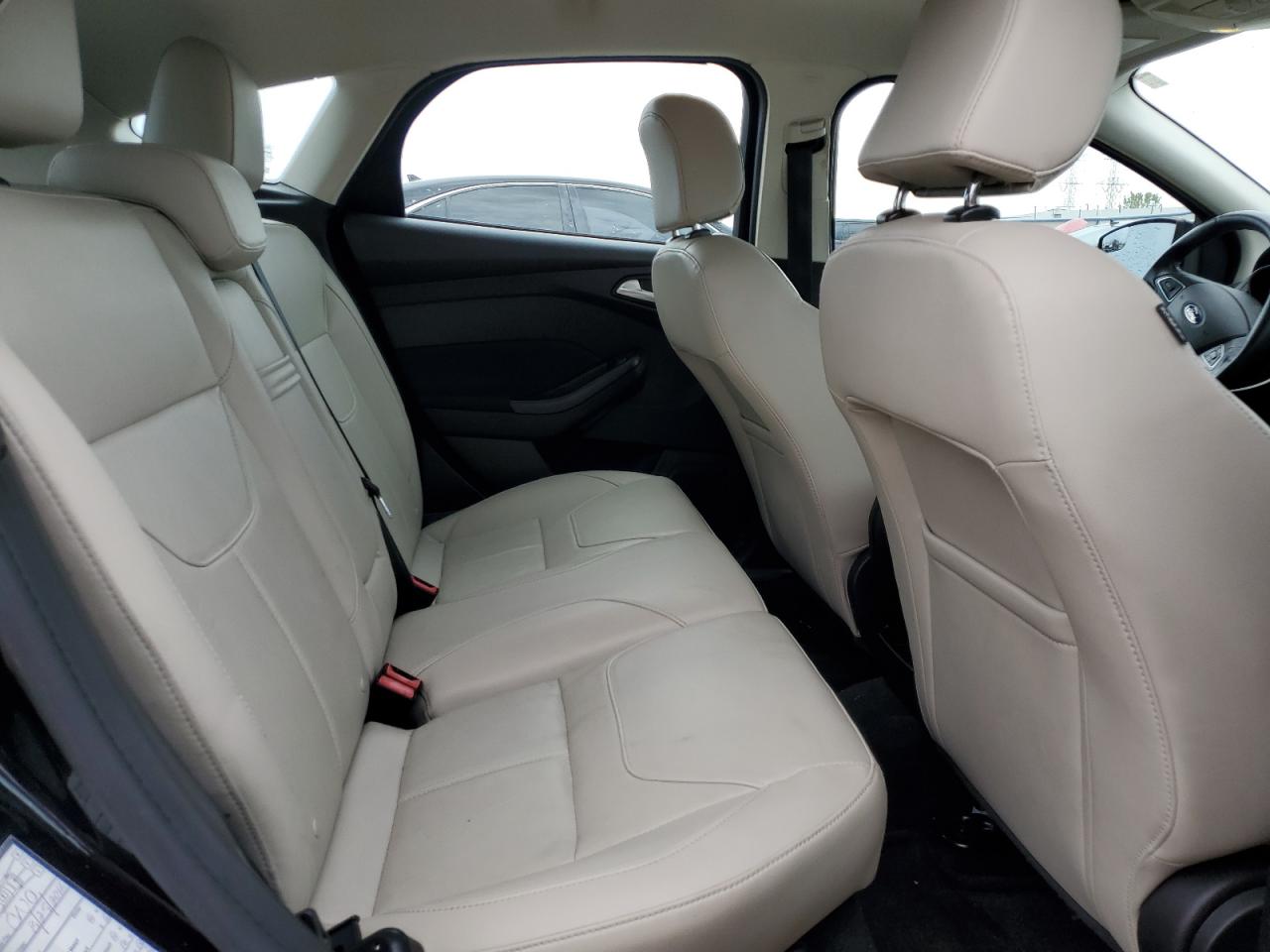 2016 Ford Focus Titanium VIN: 1FADP3N23GL302616 Lot: 81018465