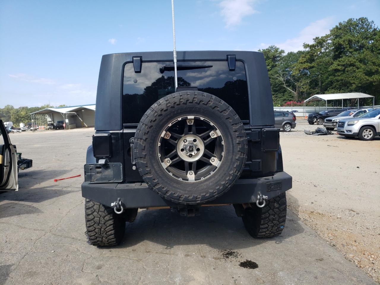 2009 Jeep Wrangler Unlimited Sahara VIN: 1J8GA59119L748734 Lot: 71823575