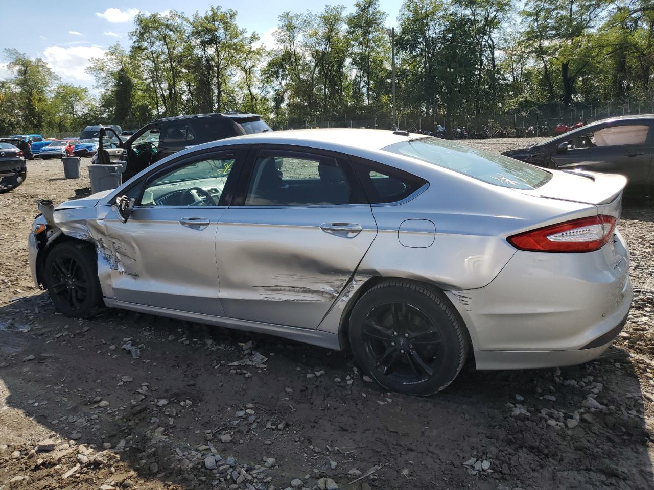 2015 Ford Fusion Se Hybrid VIN: 3FA6P0LU7FR165028 Lot: 83786435