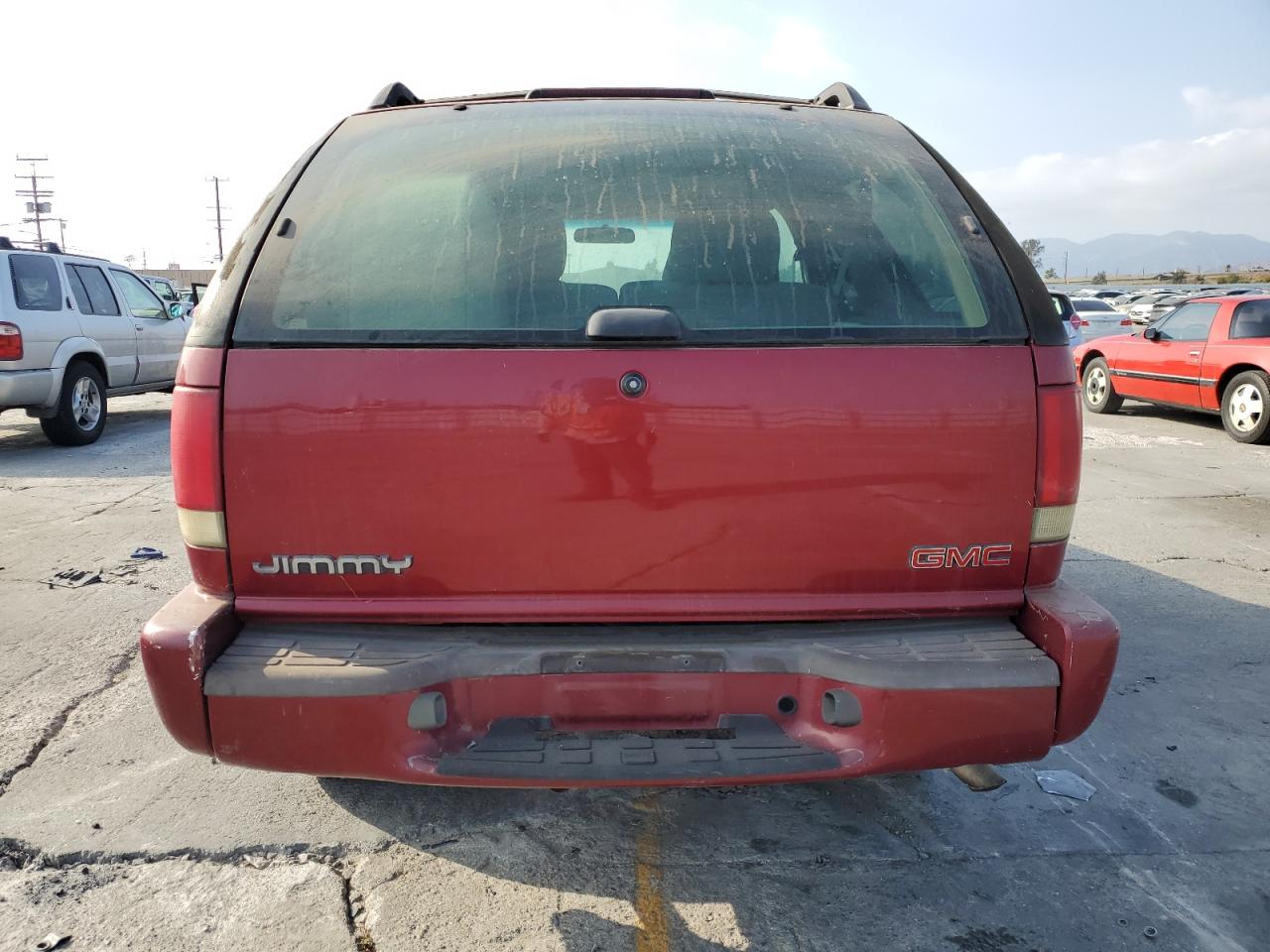 2001 GMC Jimmy VIN: 1GKCS18W21K173826 Lot: 80591435