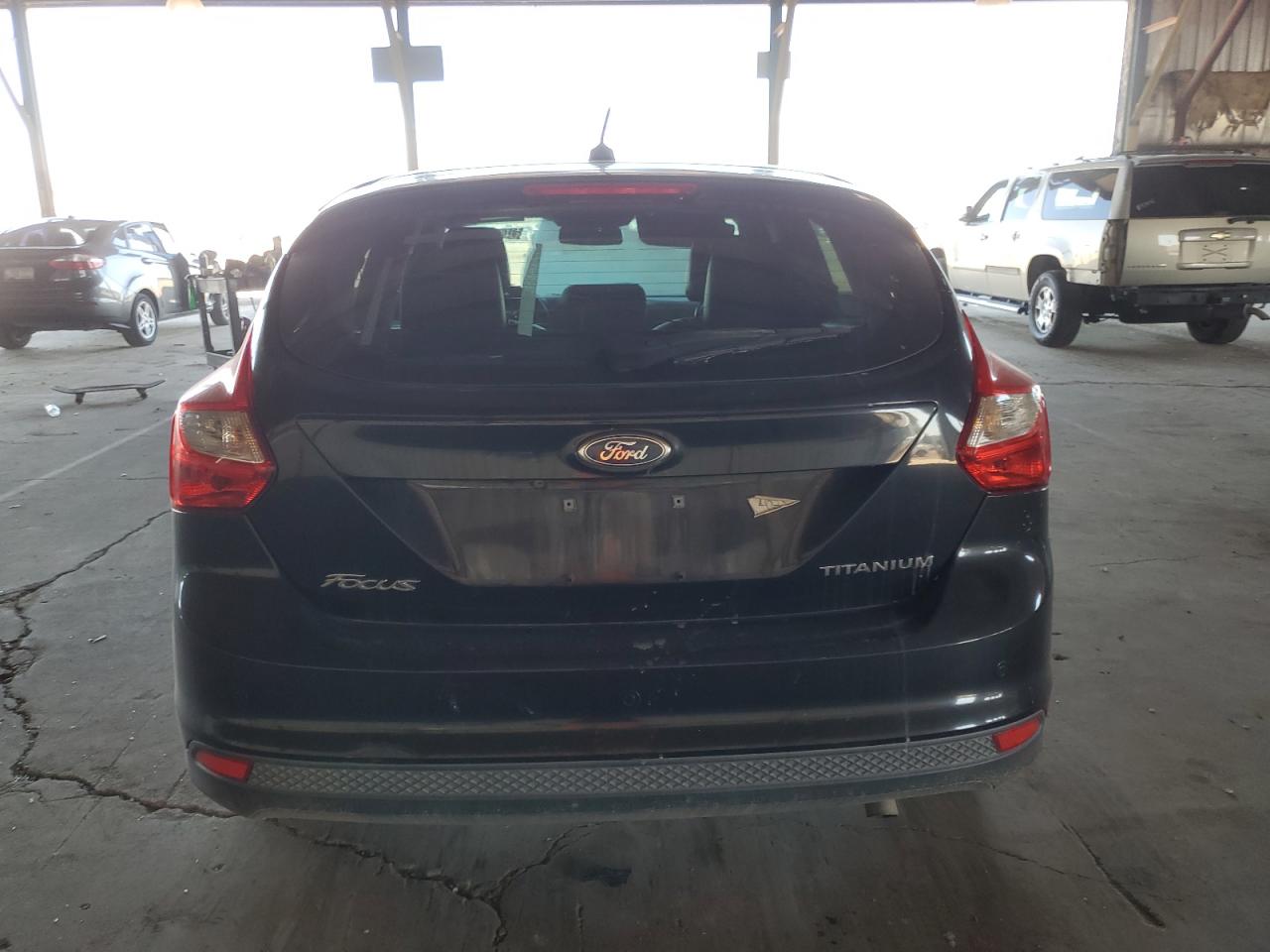 2012 Ford Focus Titanium VIN: 1FAHP3N21CL290526 Lot: 81444685
