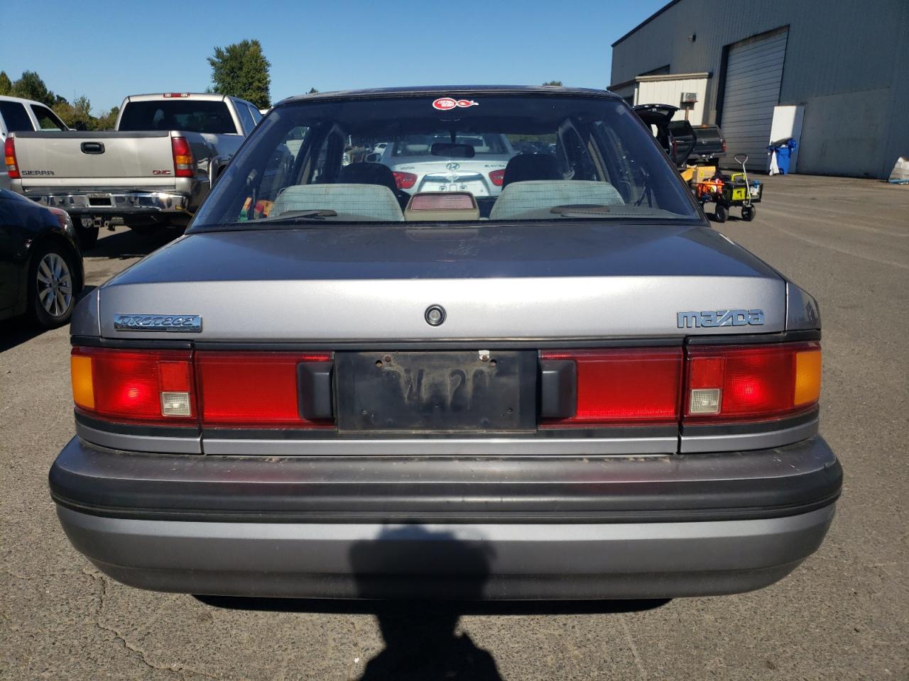 1991 Mazda Protege Lx VIN: JM1BG2266M0290803 Lot: 81856185