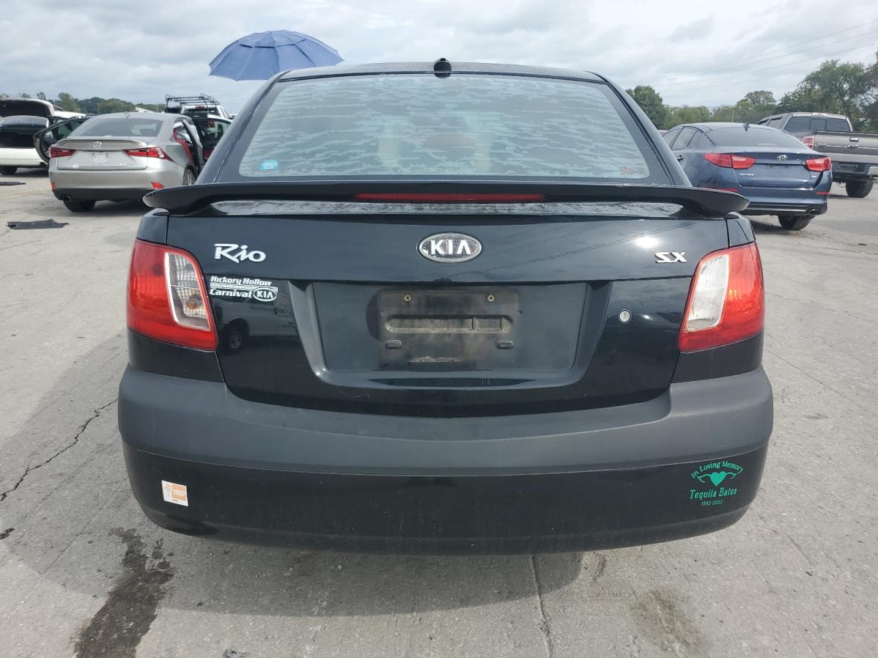 2009 Kia Rio Base VIN: KNADE223296574855 Lot: 81756585
