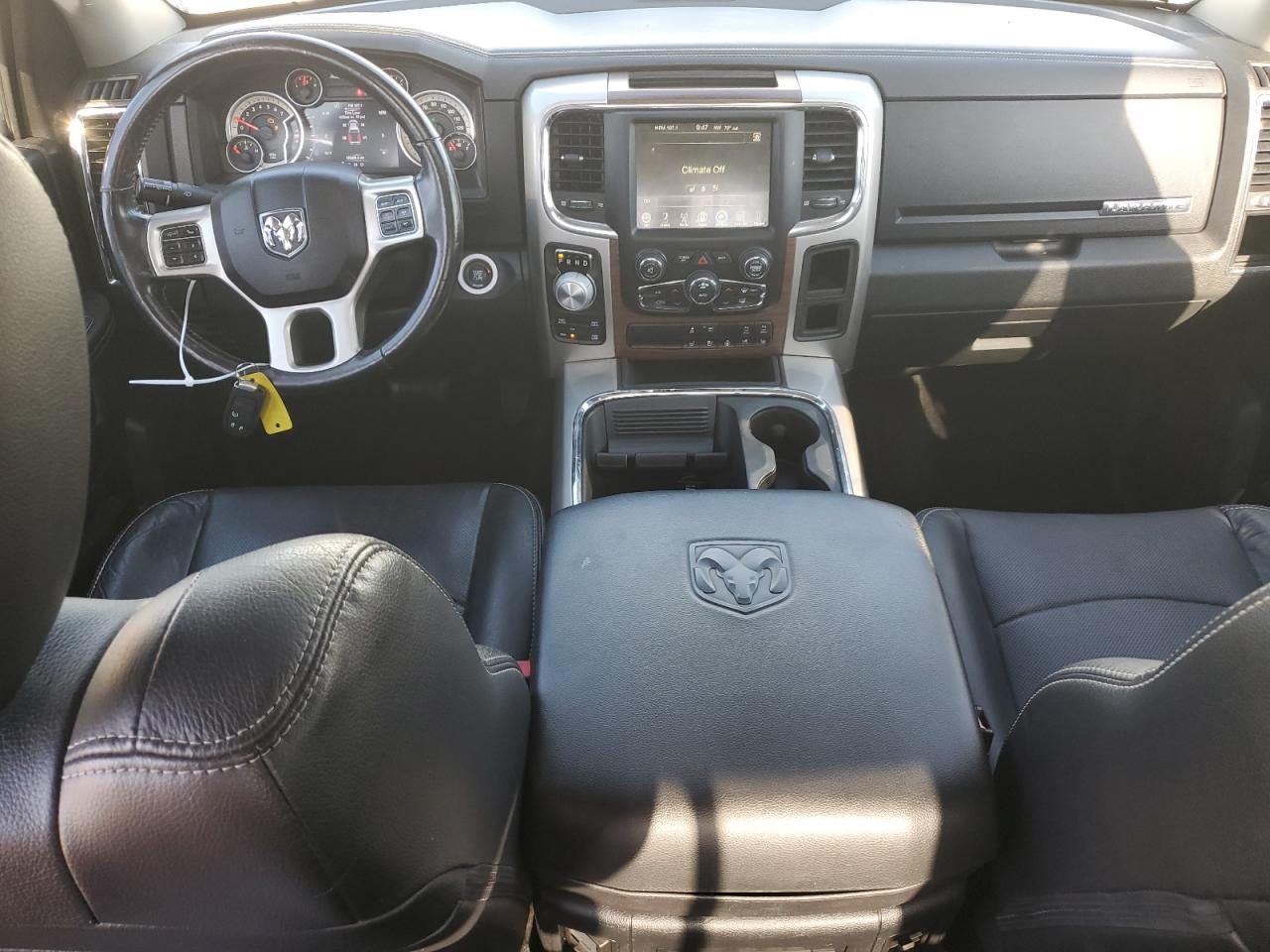 2015 Ram 1500 Laramie VIN: 1C6RR7NT8FS777054 Lot: 84292575