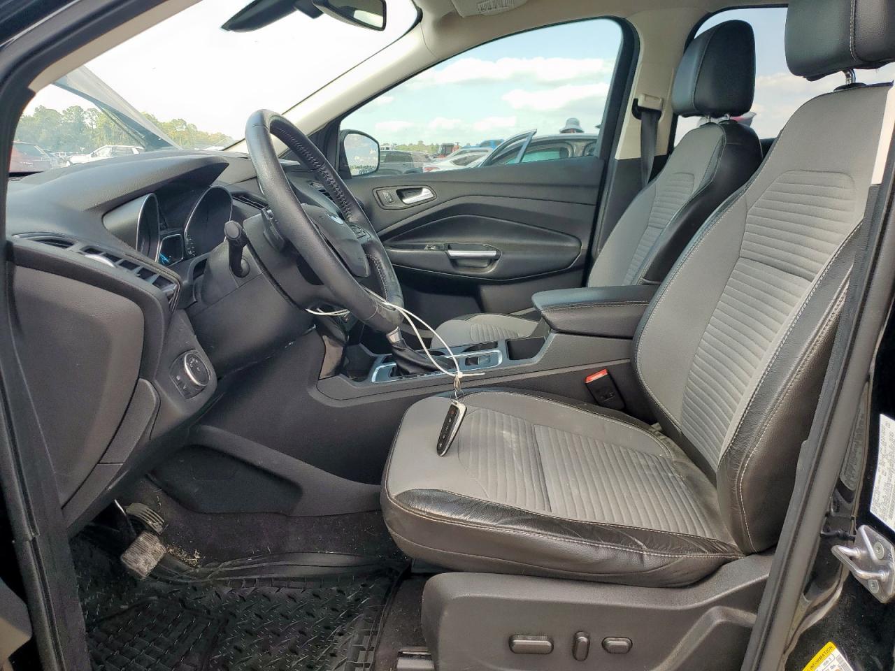 2017 Ford Escape Titanium VIN: 1FMCU0J98HUF06898 Lot: 84376745