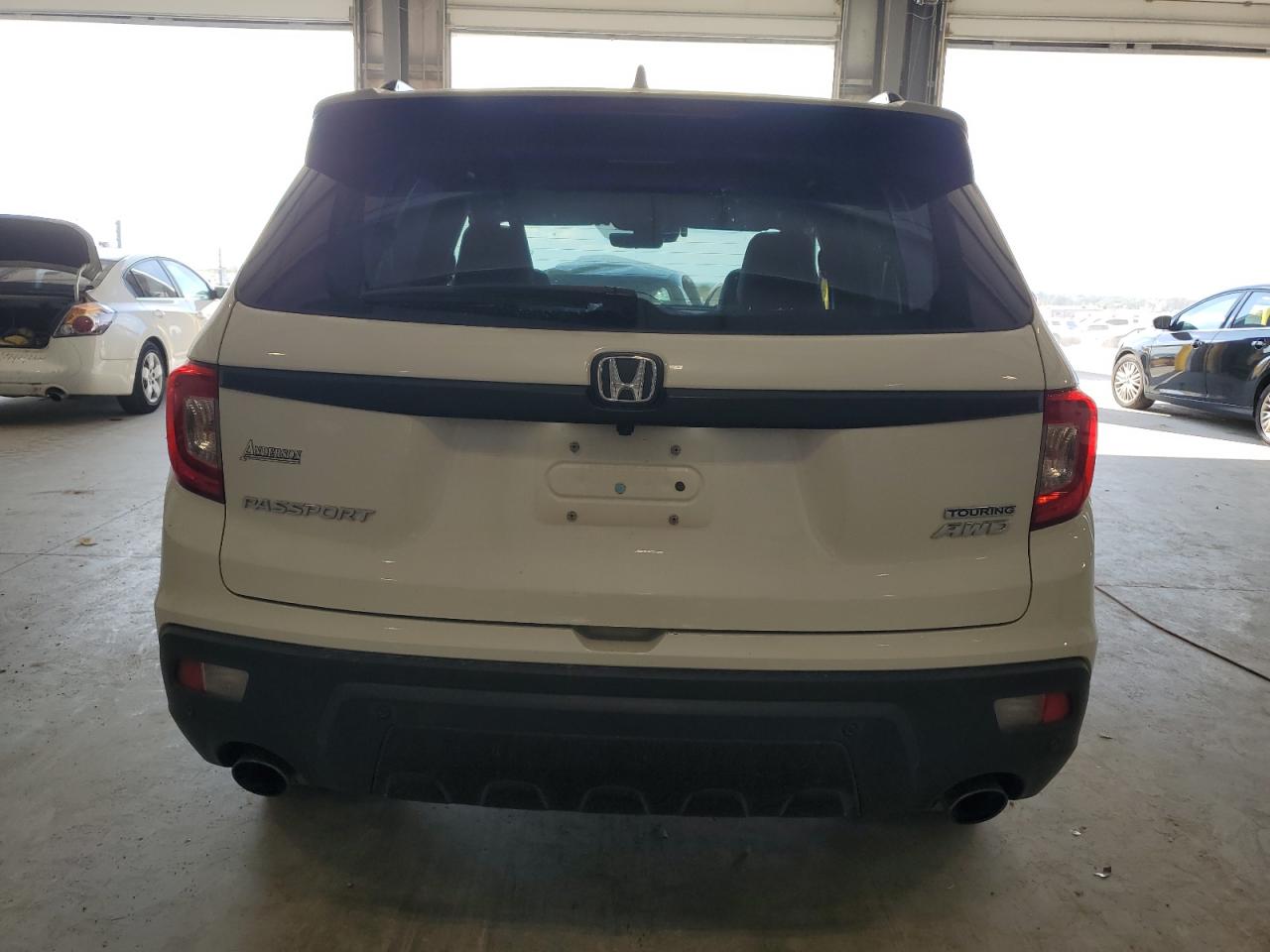 2019 Honda Passport Touring VIN: 5FNYF8H94KB000641 Lot: 81746925
