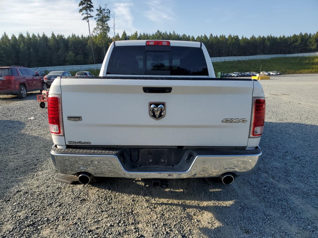 2015 Ram 1500 Laramie VIN: 1C6RR7NT7FS790295 Lot: 81797525