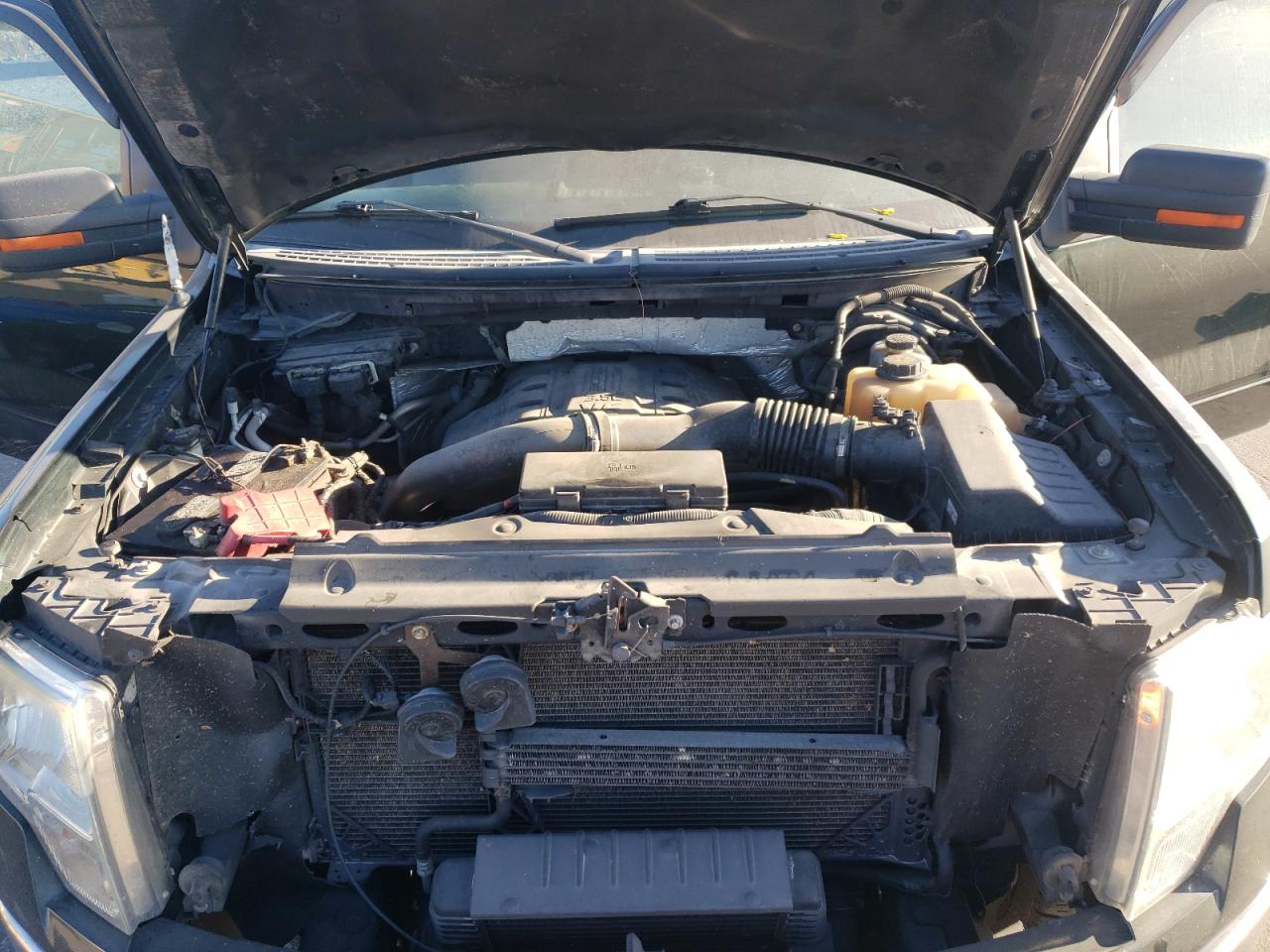 2012 Ford F150 Super Cab VIN: 1FTFX1ET7CFB31670 Lot: 70999875