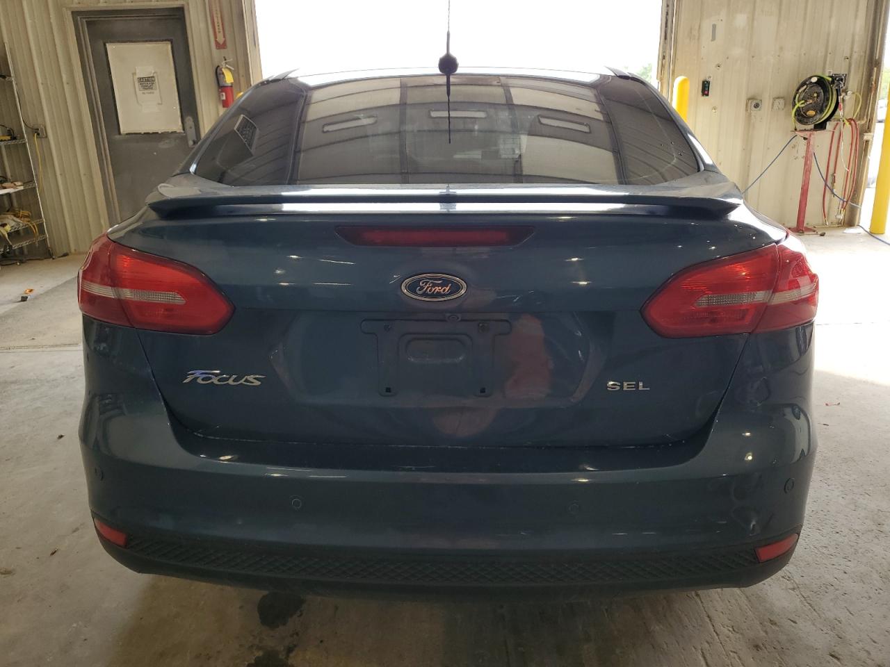 2018 Ford Focus Sel VIN: 1FADP3H28JL217497 Lot: 81597195