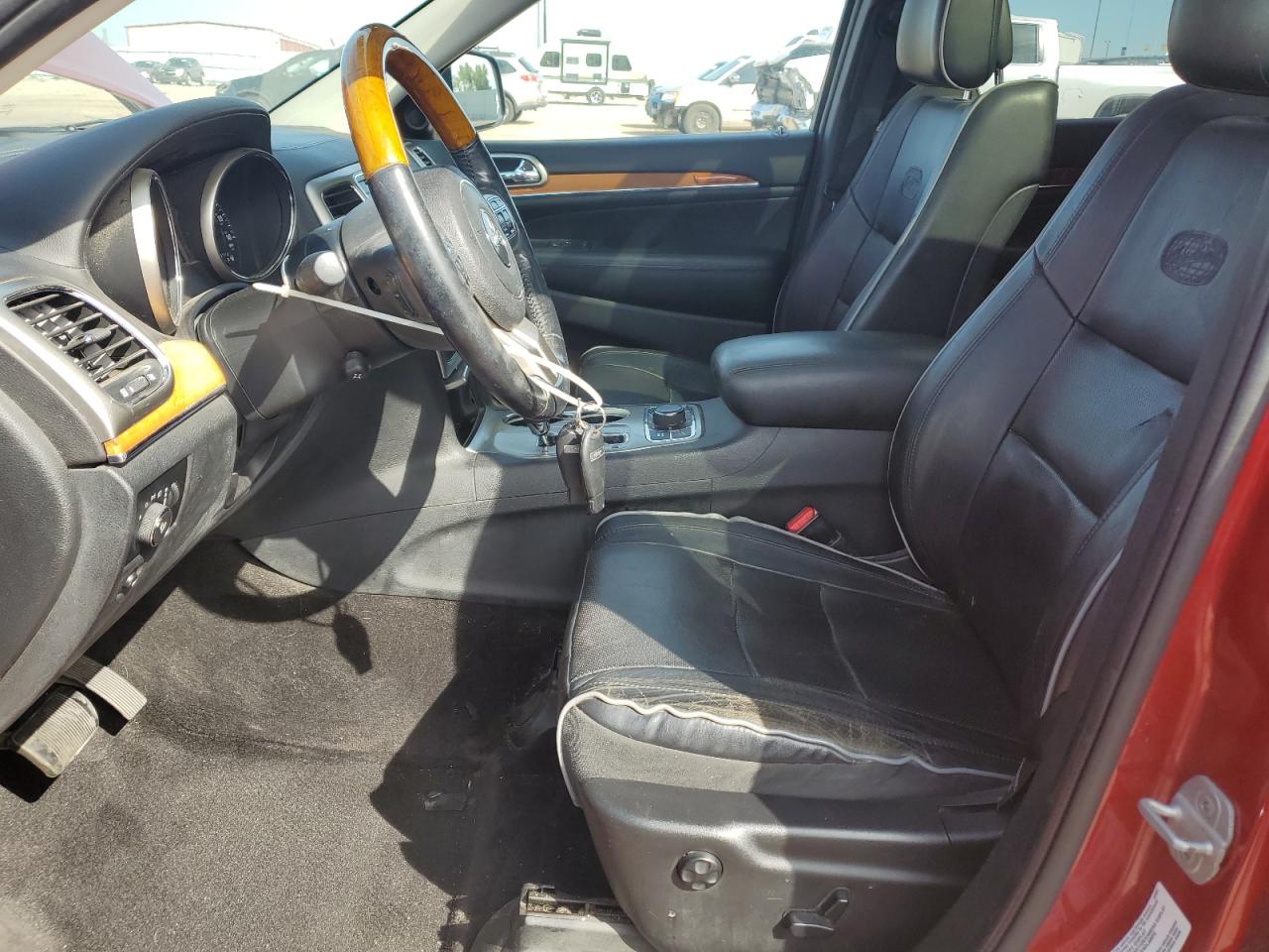 2011 Jeep Grand Cherokee Overland VIN: 1J4RR6GT4BC702477 Lot: 80075475