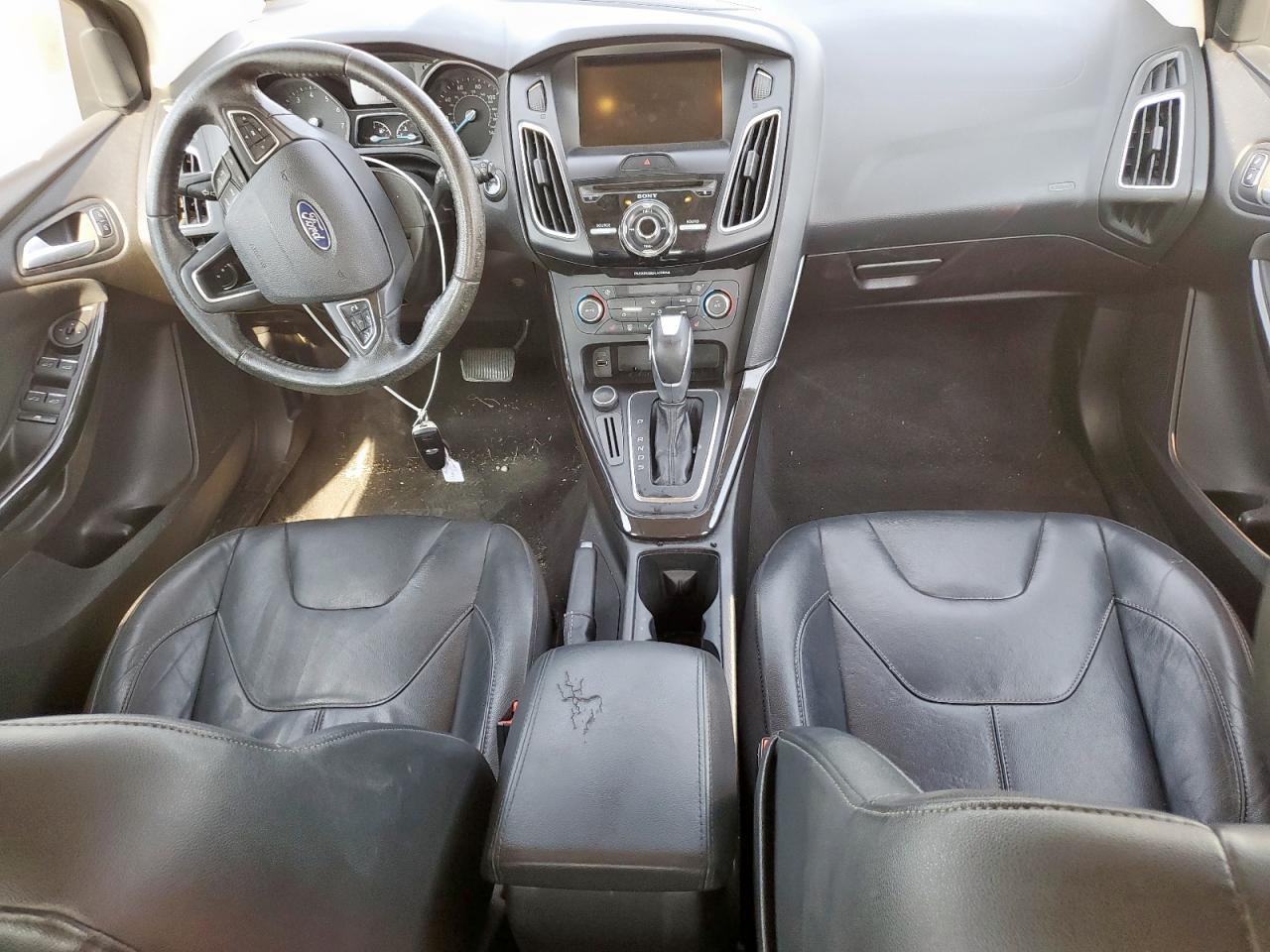 2015 Ford Focus Titanium VIN: 1FADP3N27FL334192 Lot: 80576865