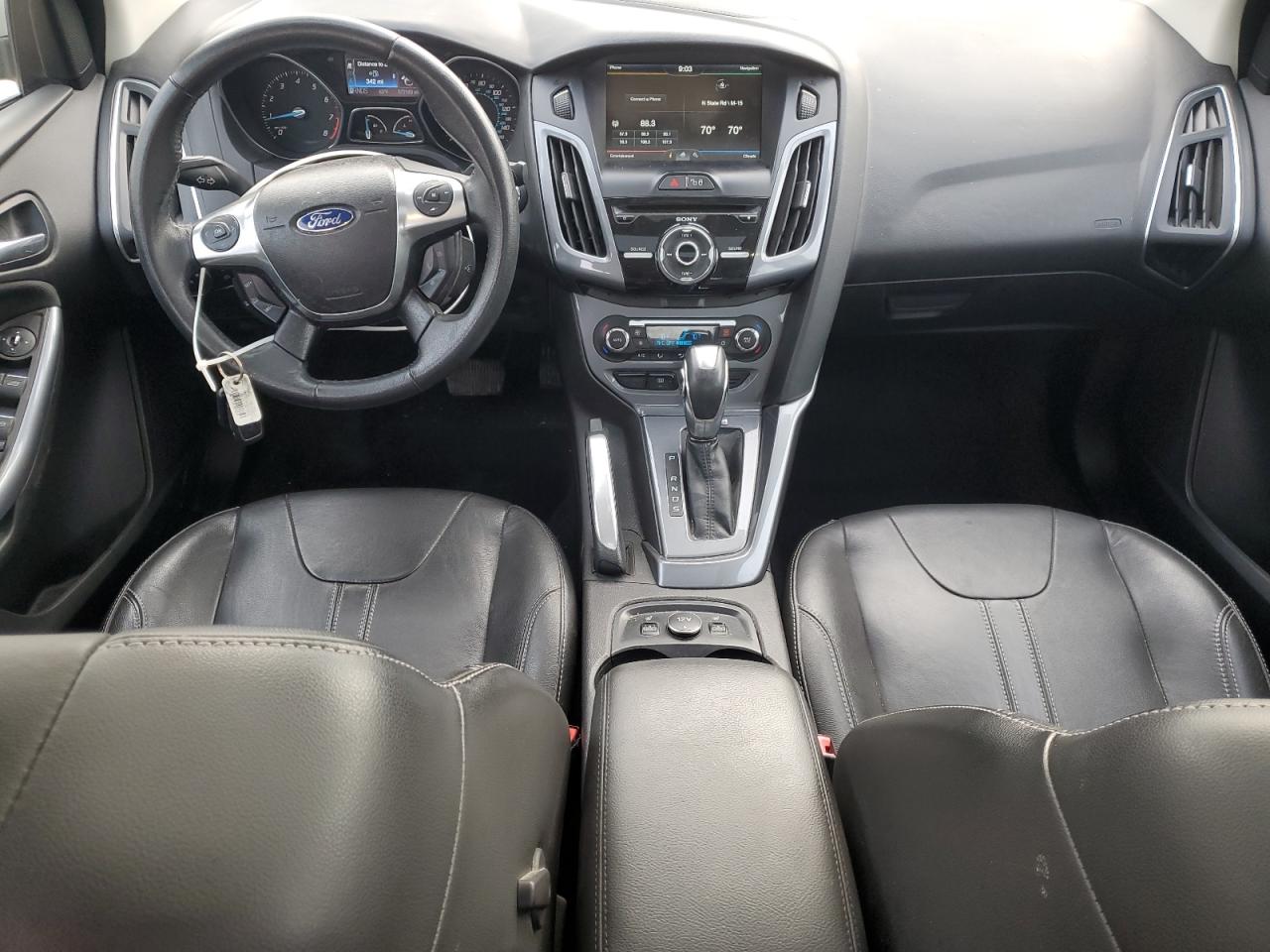 2012 Ford Focus Titanium VIN: 1FAHP3J22CL174077 Lot: 80637715