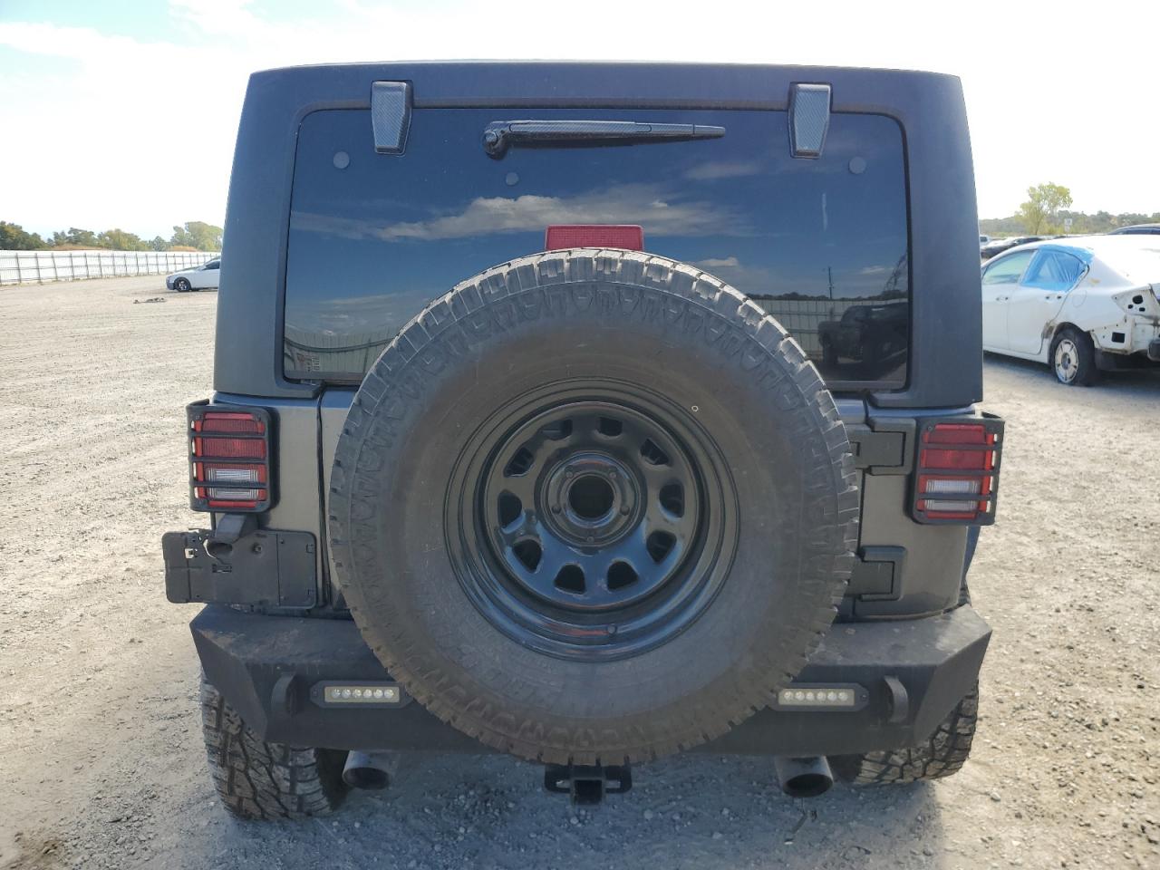 2016 Jeep Wrangler Unlimited Sport VIN: 1C4BJWDG7GL311238 Lot: 80025595