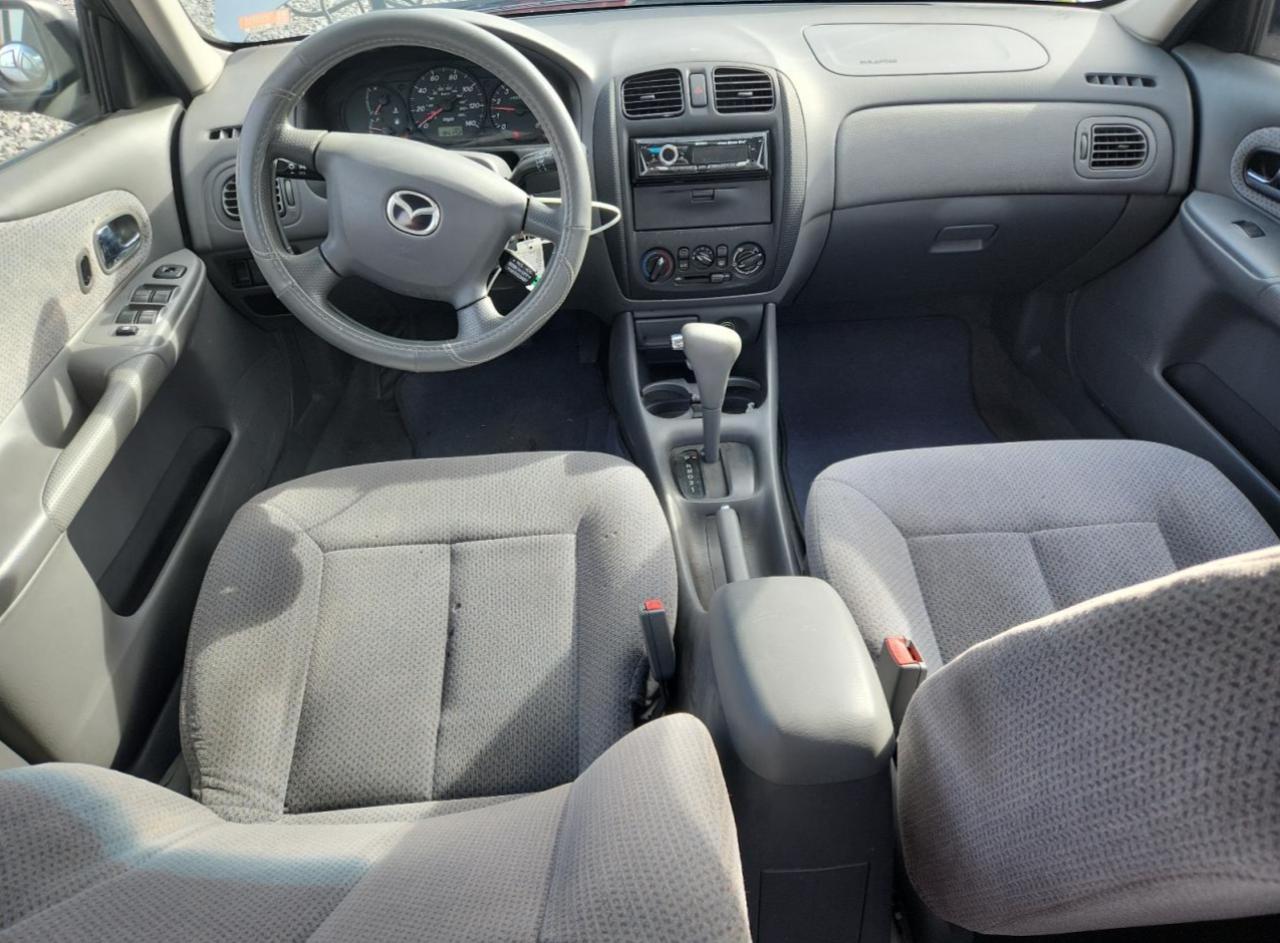 2000 Mazda Protege Dx VIN: JM1BJ2226Y0241394 Lot: 84044025