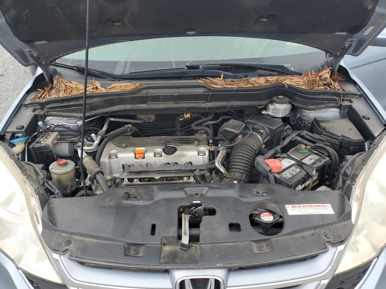 2010 Honda Cr-V Exl VIN: JHLRE4H79AC012748 Lot: 80513885