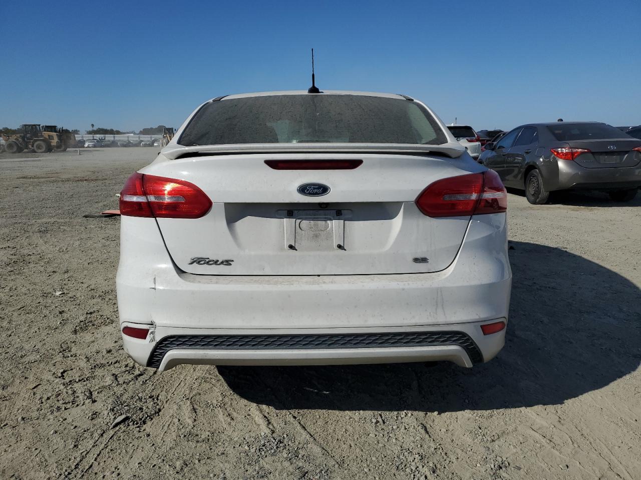 2016 Ford Focus Se VIN: 1FADP3F21GL238722 Lot: 80930125