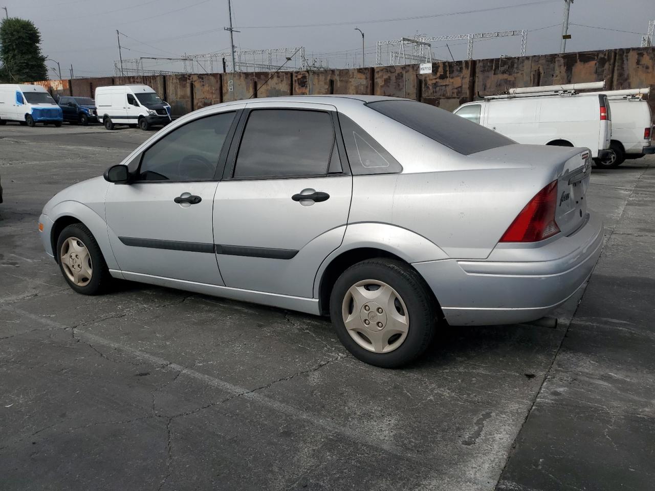 2002 Ford Focus Lx silver sedan gas 1FAFP33P32W140422 photo #3