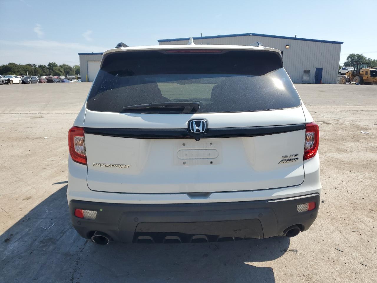 2021 Honda Passport Elite VIN: 5FNYF8H07MB010830 Lot: 81184425