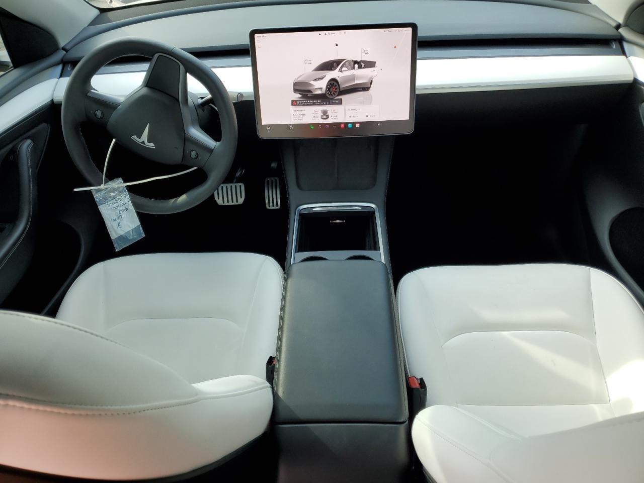 2023 Tesla Model Y VIN: 7SAYGDEF1PF705018 Lot: 82044395