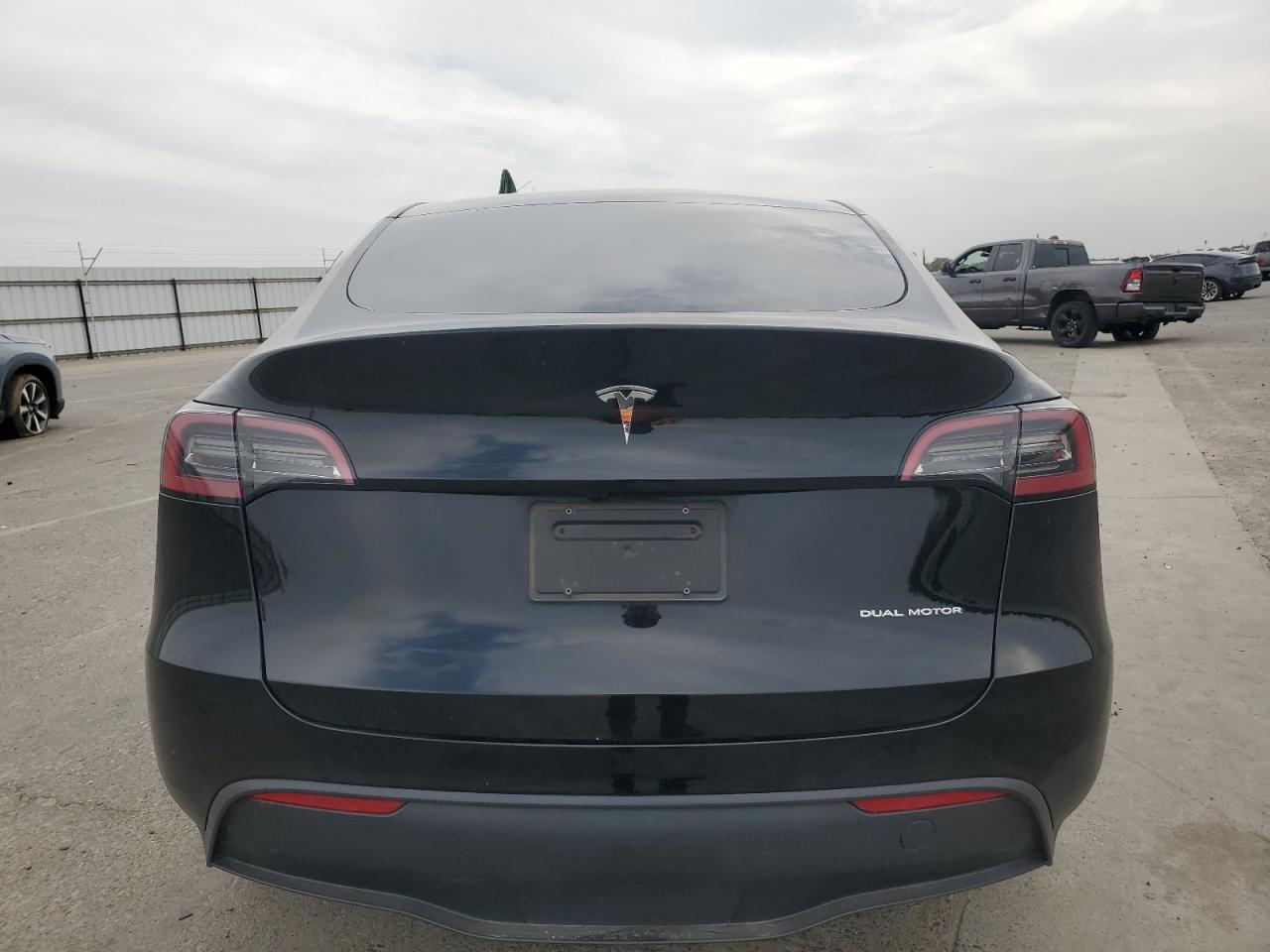 2023 Tesla Model Y VIN: 7SAYGDEE0PA184880 Lot: 84631205