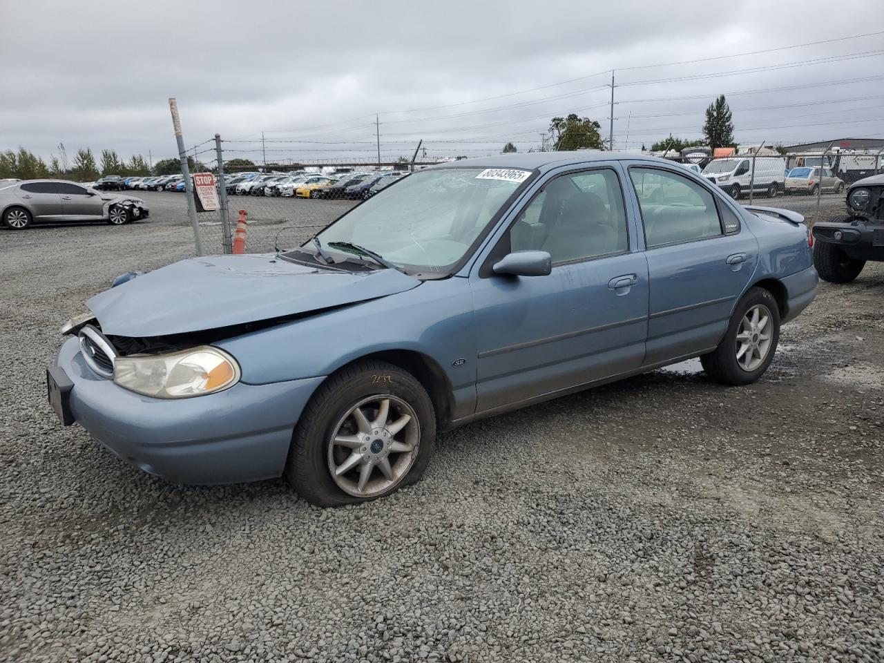 3FAFP66L4YM101728 FORD CONTOUR Photo 1