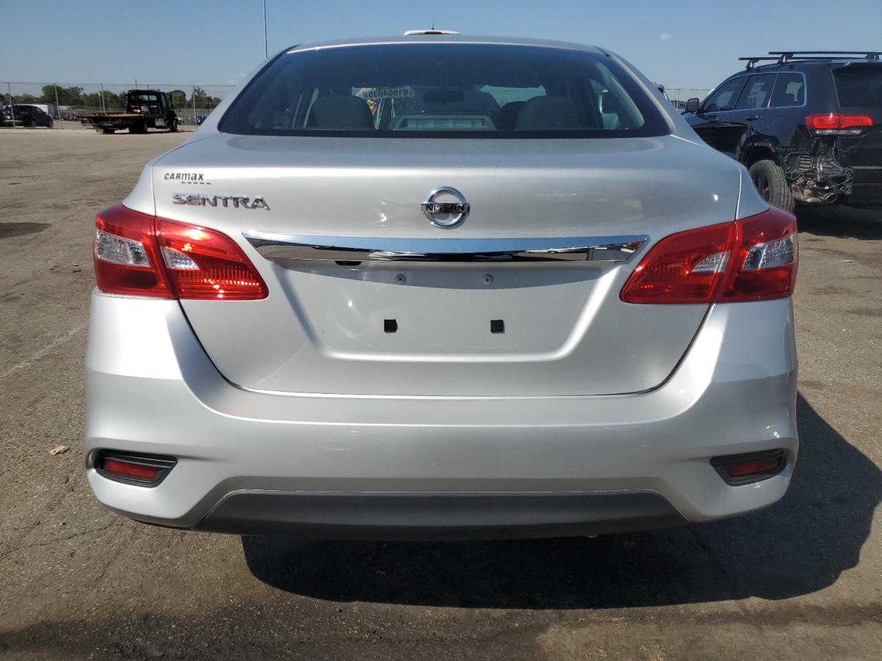 2019 Nissan Sentra S VIN: 3N1AB7AP9KY409791 Lot: 81904035