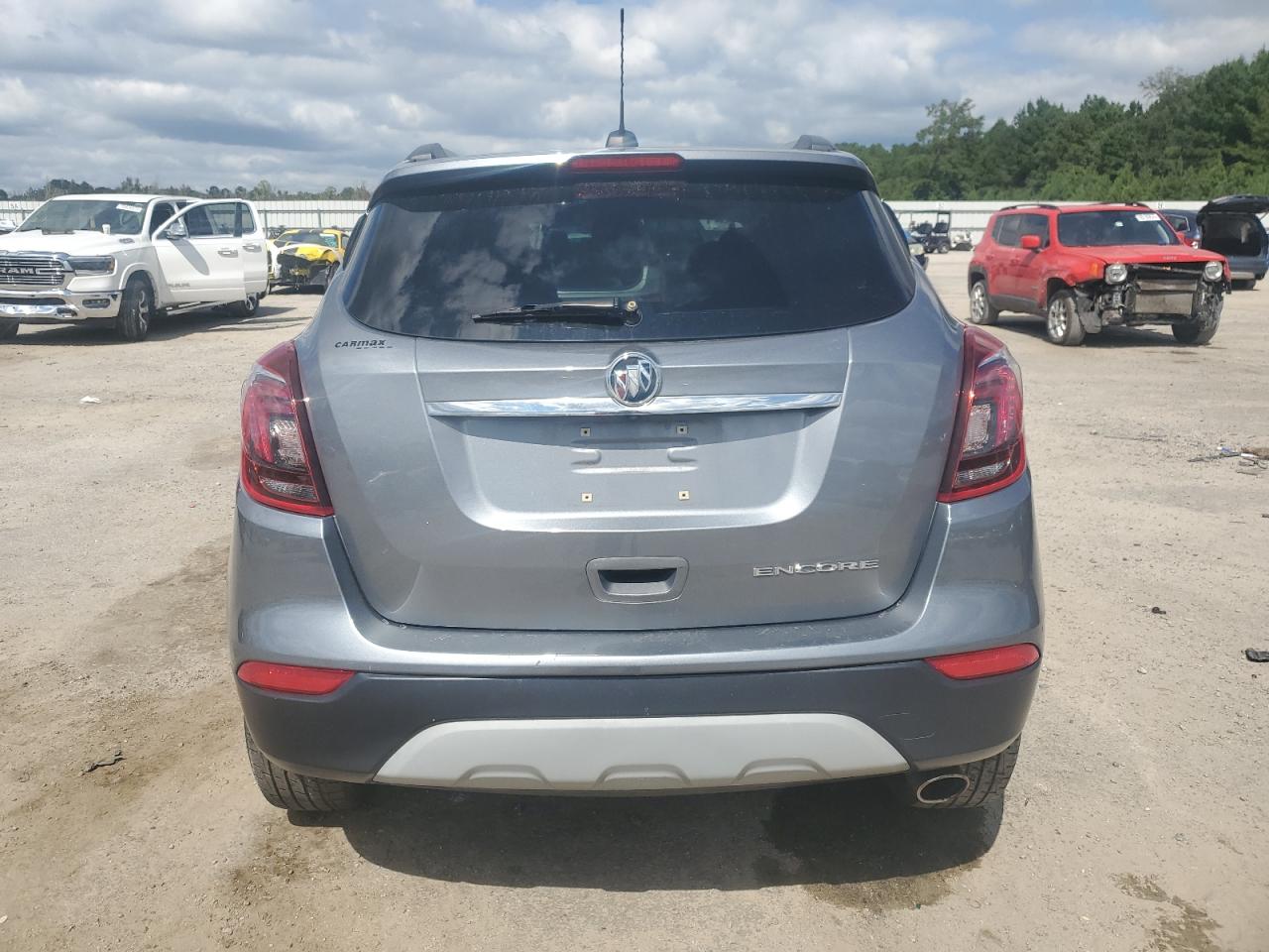 2019 Buick Encore Essence VIN: KL4CJCSM7KB870387 Lot: 80365945
