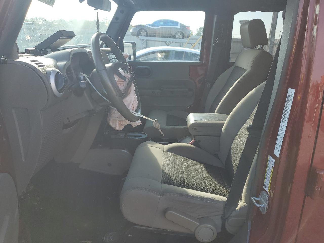 2010 Jeep Wrangler Unlimited Sahara VIN: 1J4BA5H11AL128127 Lot: 82087515