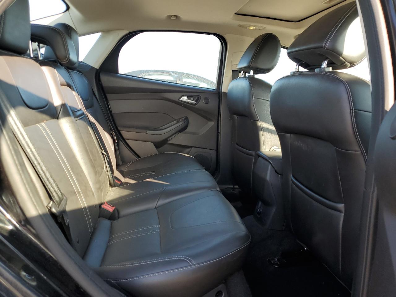 2013 Ford Focus Titanium VIN: 1FADP3J29DL303609 Lot: 81034625