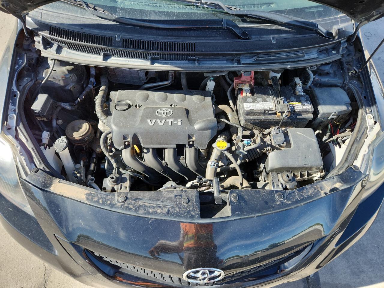 2009 Toyota Yaris VIN: JTDBT903X91346207 Lot: 81312075