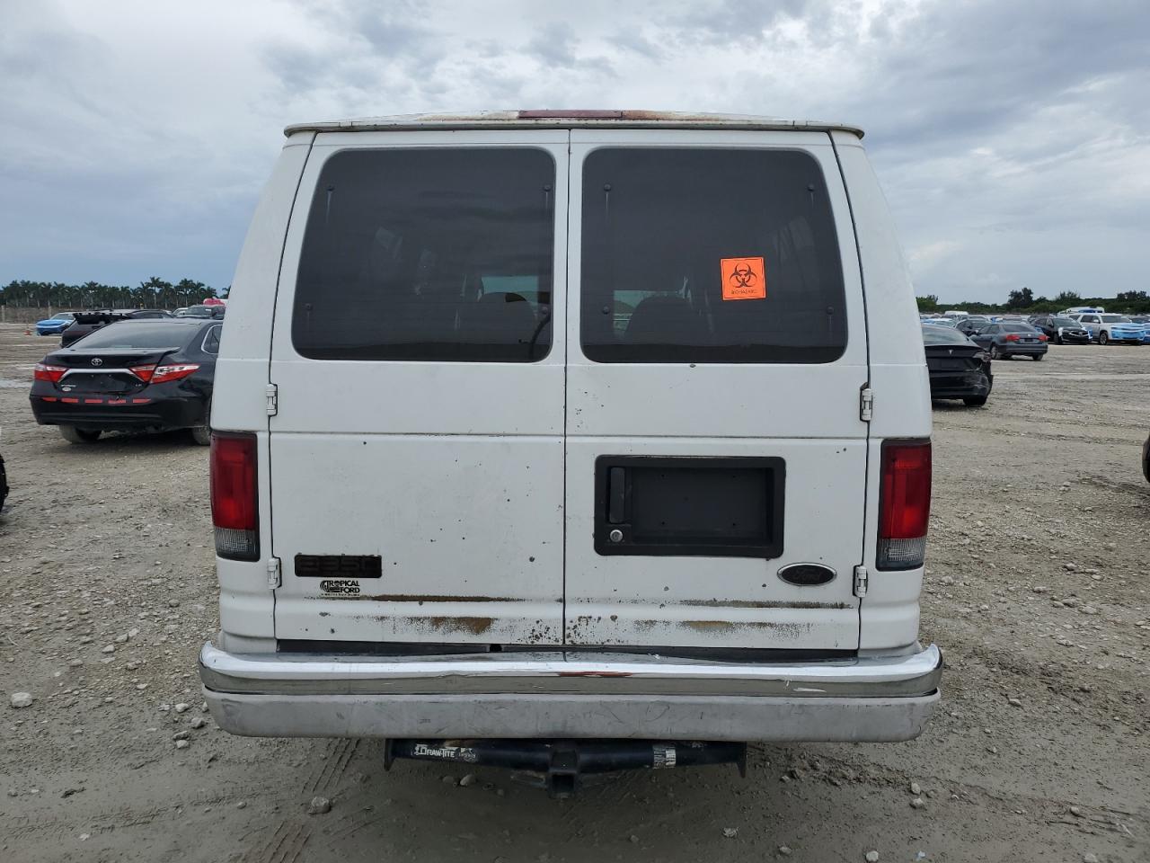 2004 Ford Econoline E350 Super Duty Wagon VIN: 1FBSS31L64HA32962 Lot: 80161095