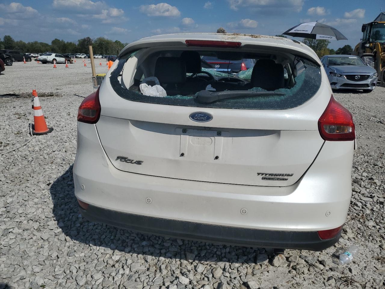 2016 Ford Focus Titanium VIN: 1FADP3N29GL303527 Lot: 81899375