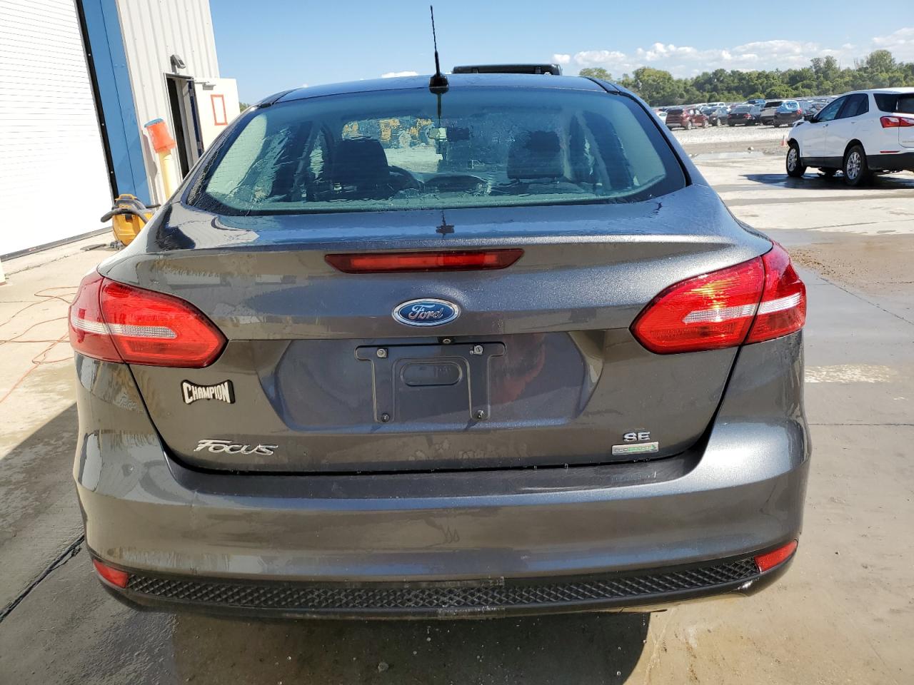 2018 Ford Focus Se VIN: 1FADP3FE2JL228413 Lot: 83864925