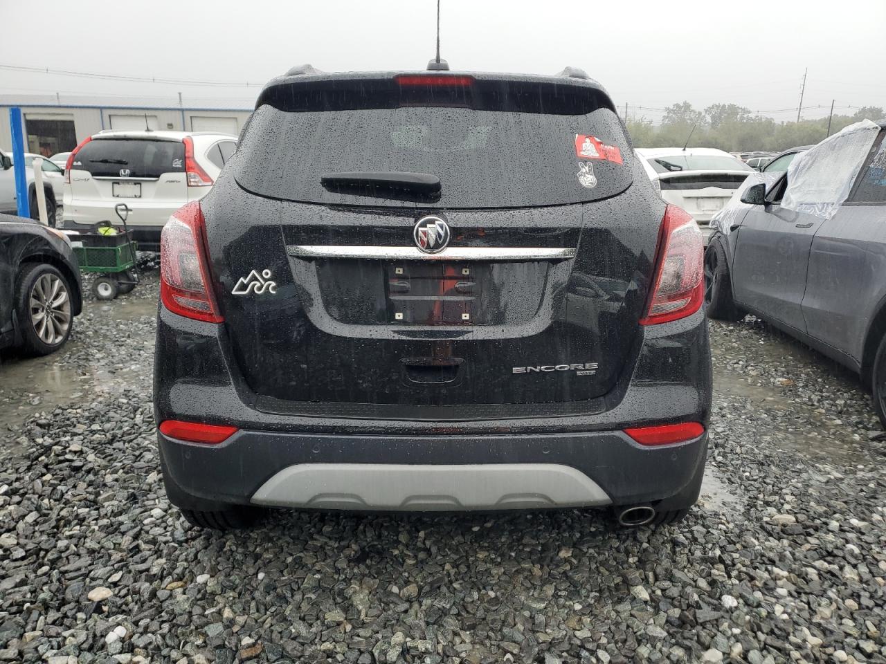 2019 Buick Encore Essence VIN: KL4CJGSM9KB732308 Lot: 83869595