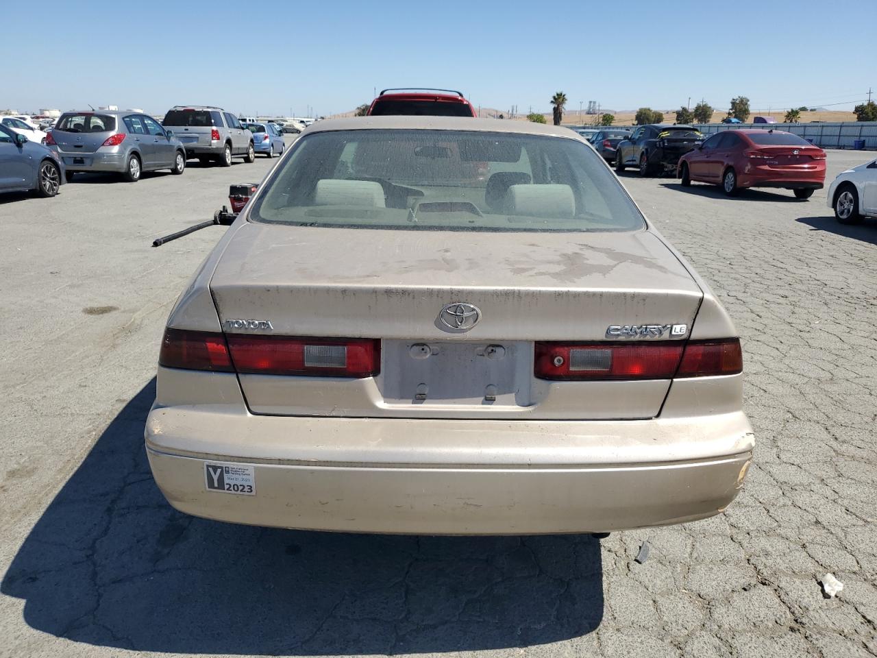 1999 Toyota Camry Le VIN: JT2BG22K5X0281763 Lot: 80859095
