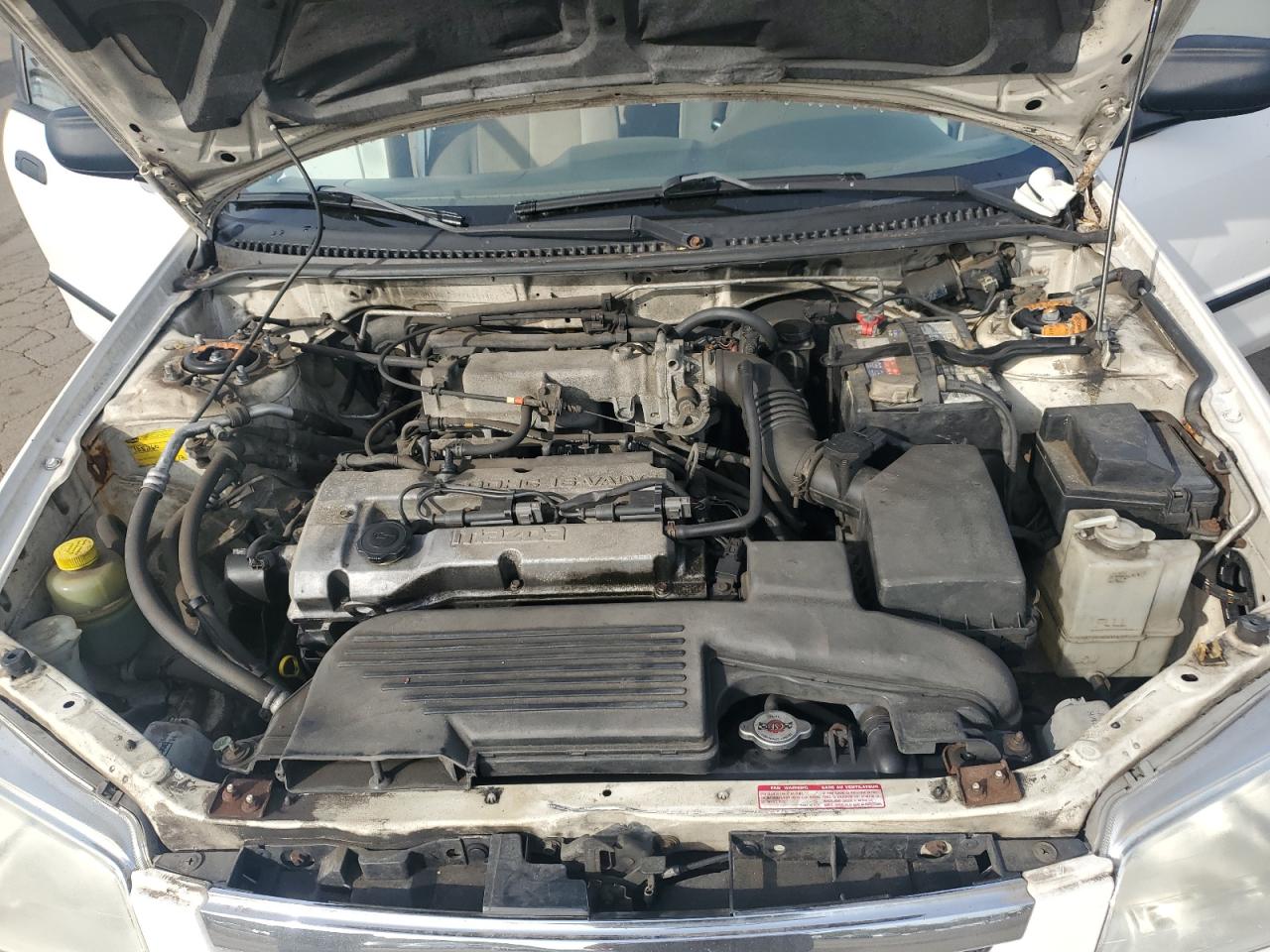 2000 Mazda Protege Dx VIN: JM1BJ222XY0308482 Lot: 84620975