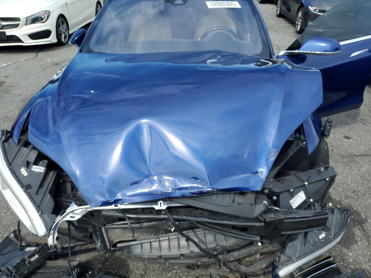 2015 Tesla Model S VIN: 5YJSA1E20FF110479 Lot: 72060365