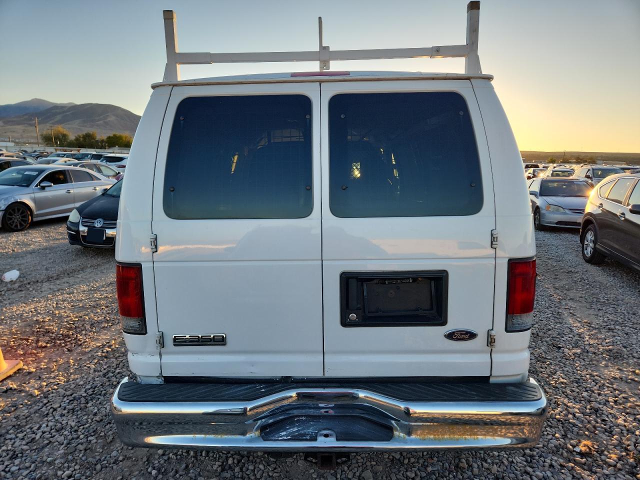 2009 Ford Econoline E350 Super Duty Van VIN: 1FTSE34L09DA20982 Lot: 82064075