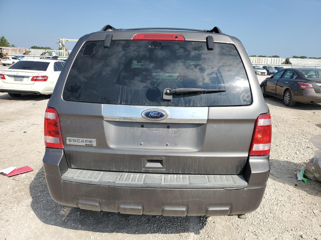 2010 Ford Escape Limited VIN: 1FMCU0E7XAKD10987 Lot: 80395815