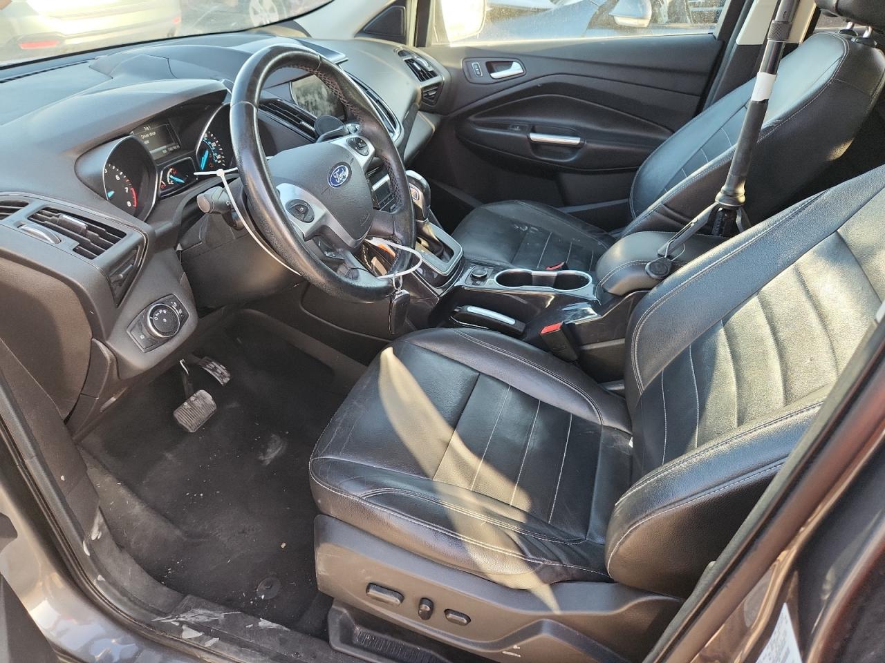 2014 Ford Escape Titanium VIN: 1FMCU0J99EUA63883 Lot: 85892565