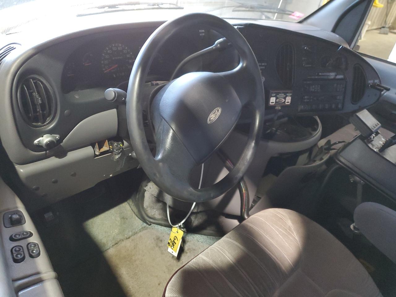 1999 Ford Econoline E150 Wagon VIN: 1FMRE11L0XHA99000 Lot: 80556465