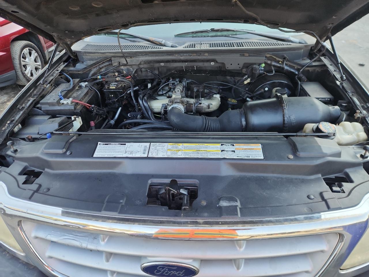 1999 Ford F150 VIN: 2FTZX1723XCA76587 Lot: 83867715