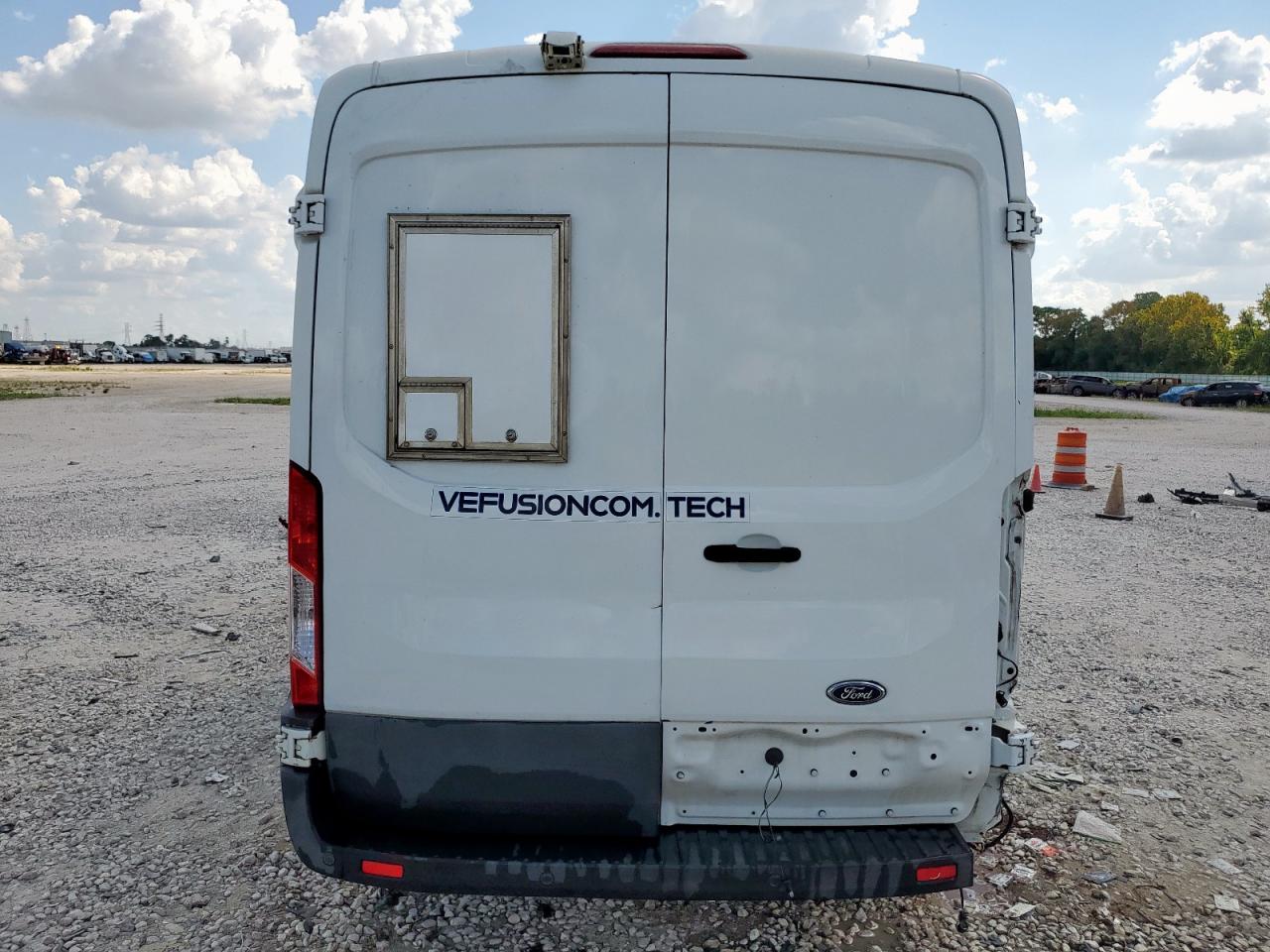 2015 Ford Transit Cargo Van T- VIN: 1FTNE1CM2FKB30001 Lot: 81146215