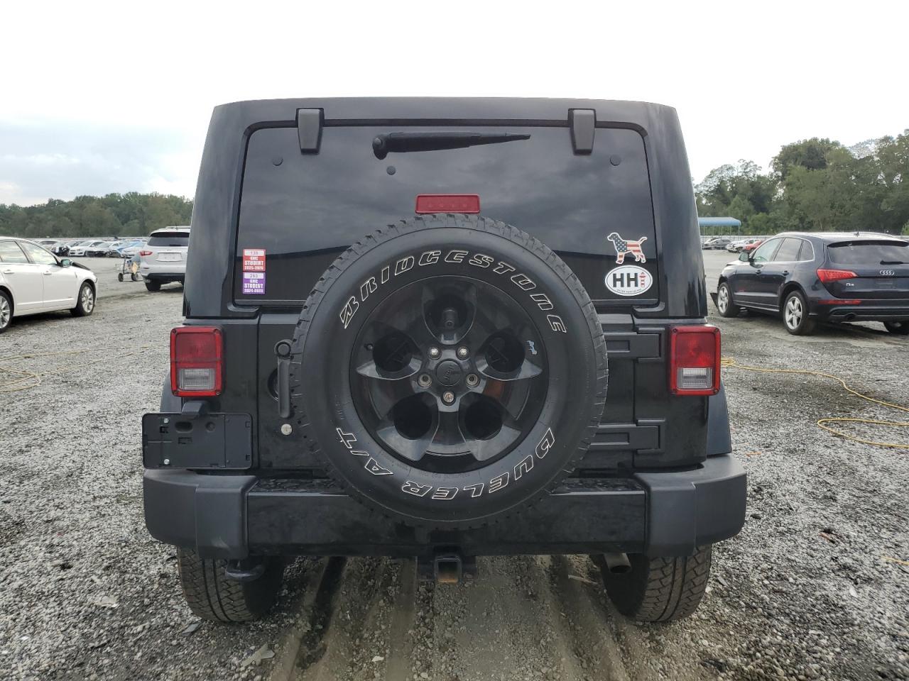 2015 Jeep Wrangler Unlimited Sahara VIN: 1C4BJWEG9FL741933 Lot: 80695405