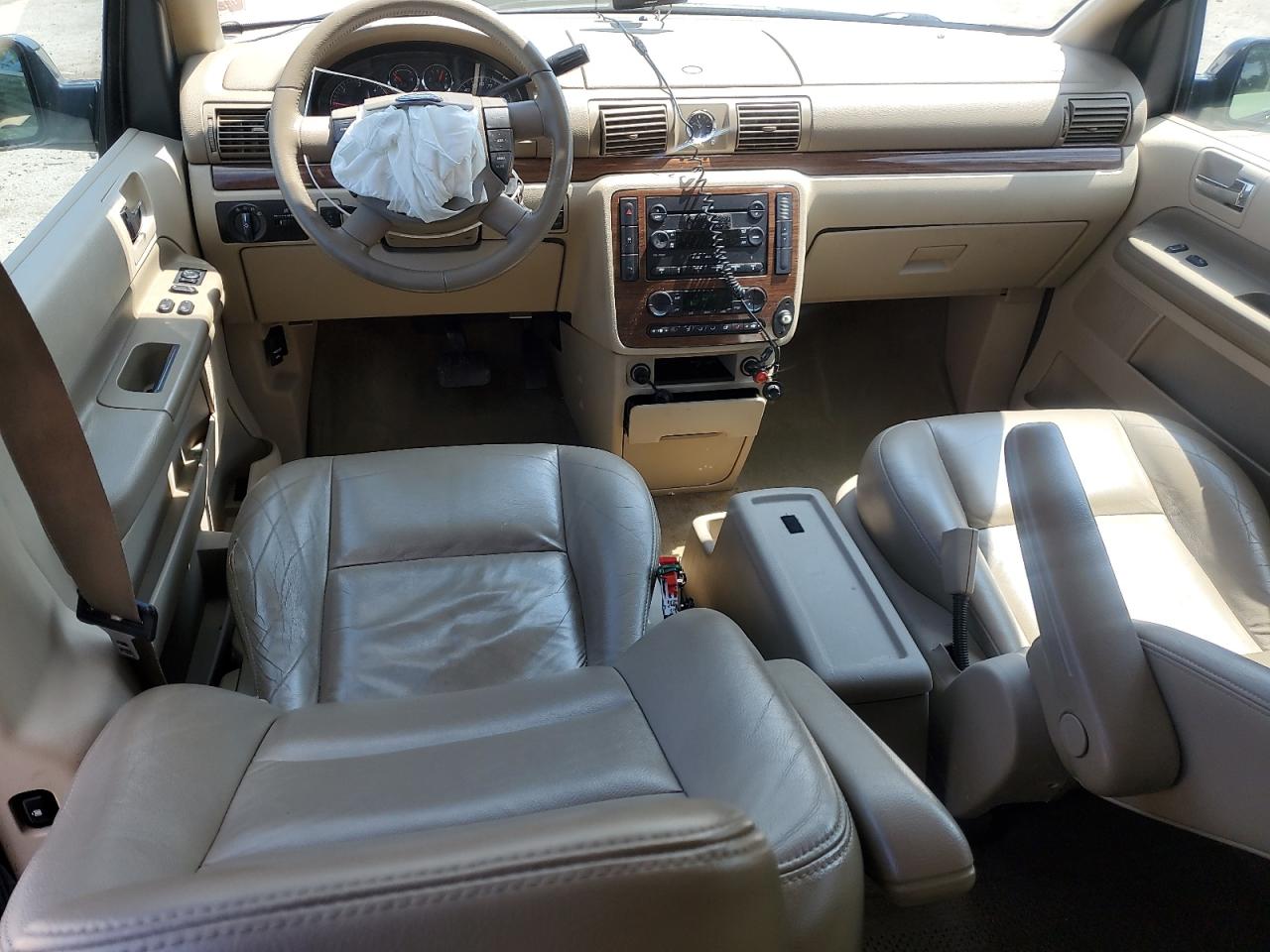 2004 Ford Freestar Limited VIN: 2FMDA58204BA57882 Lot: 71432405