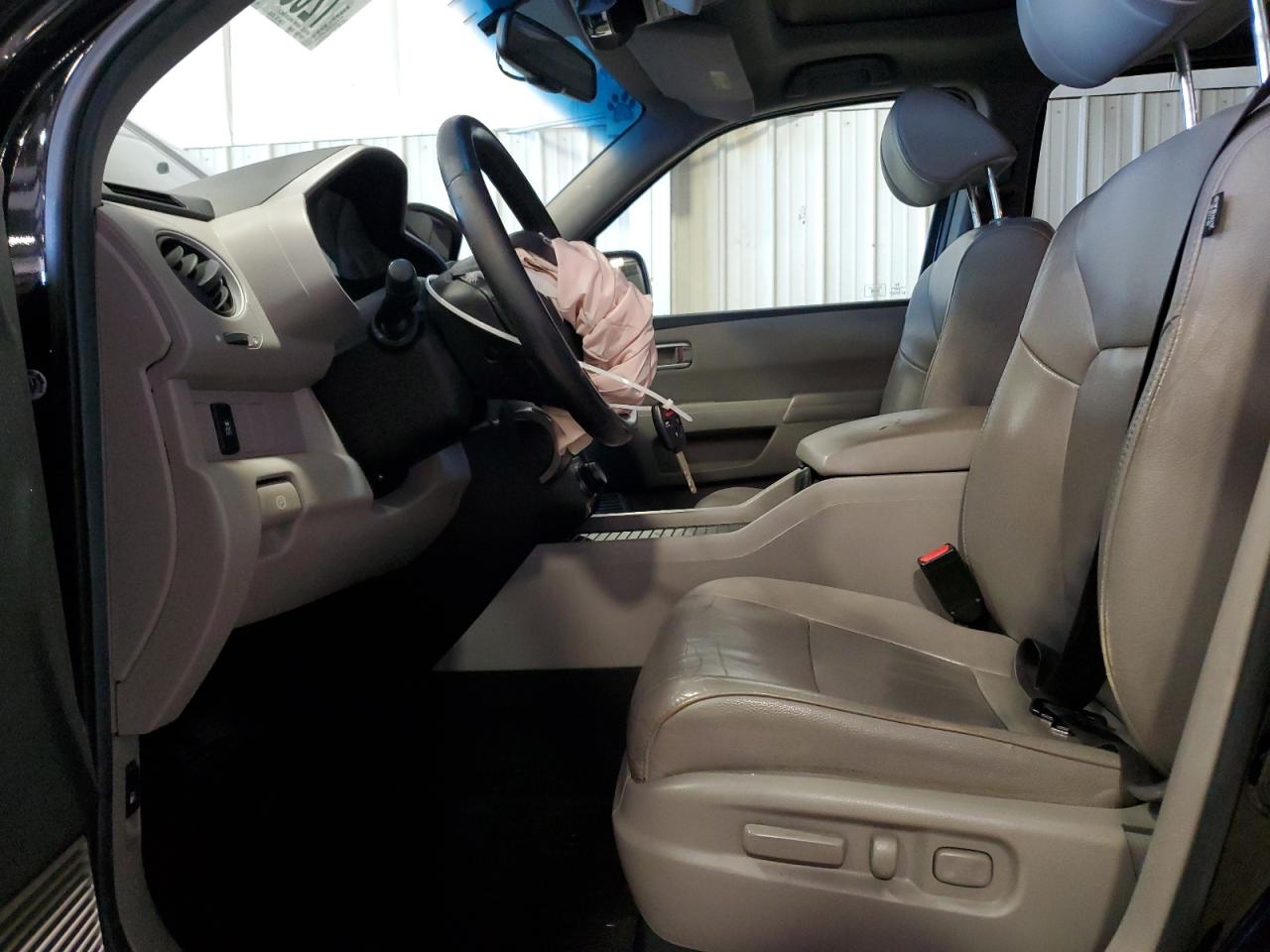 2012 Honda Pilot Exln VIN: 5FNYF4H77CB021007 Lot: 72059125