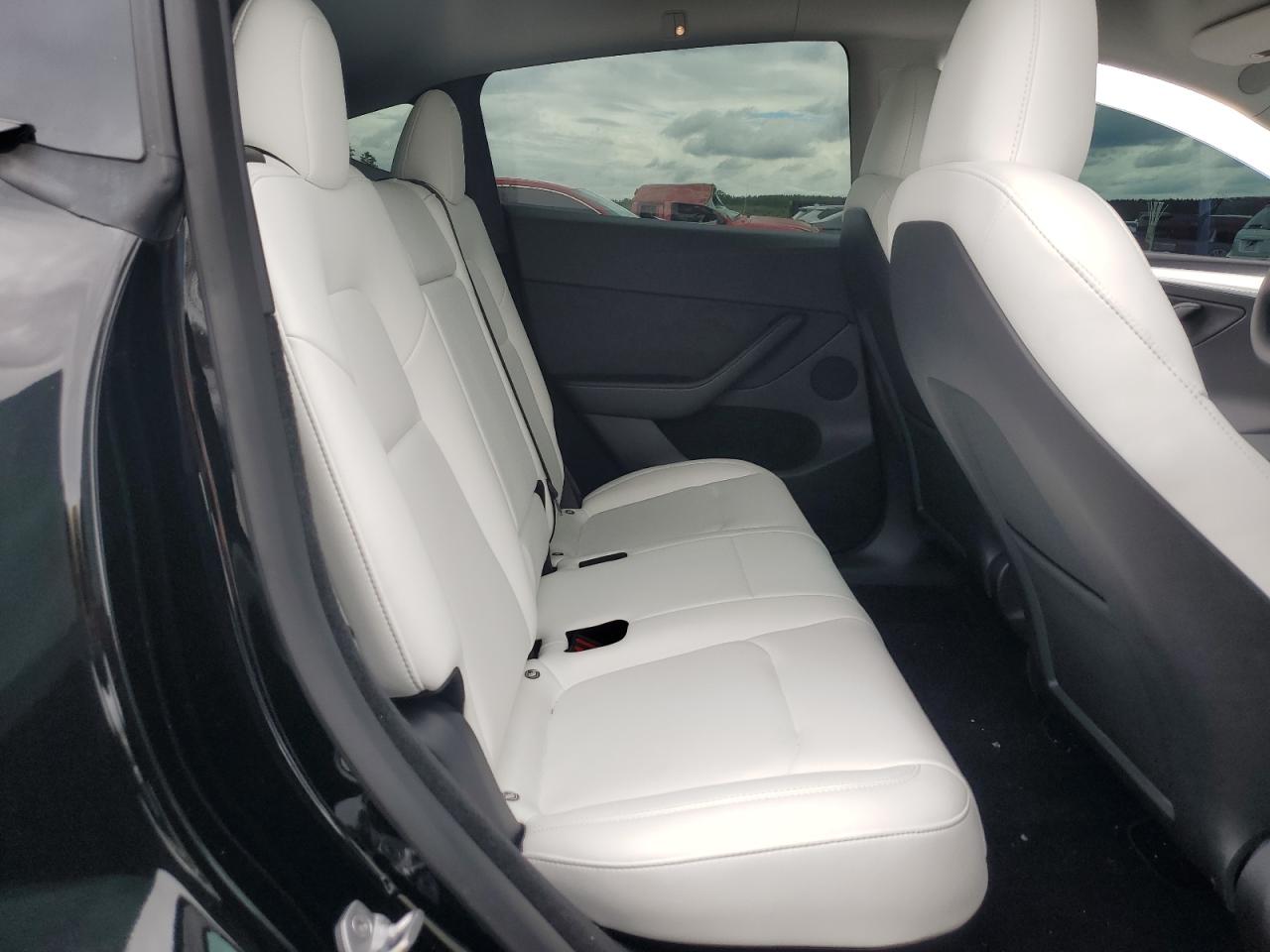 2023 Tesla Model Y VIN: 7SAYGDEF5PF705233 Lot: 84615725